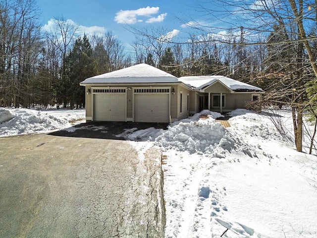 view of front of property with an attached garage and driveway