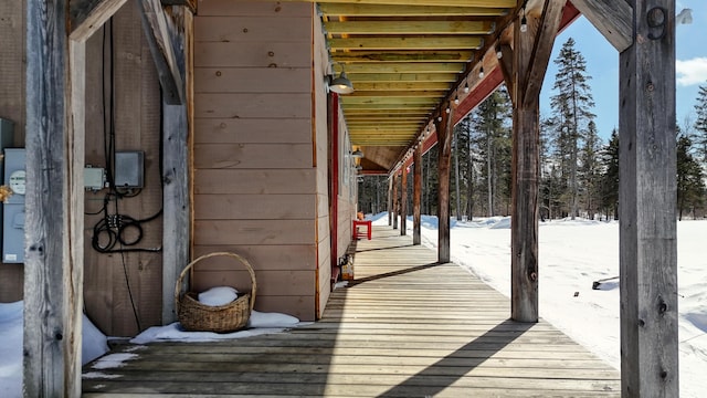 view of snow covered deck