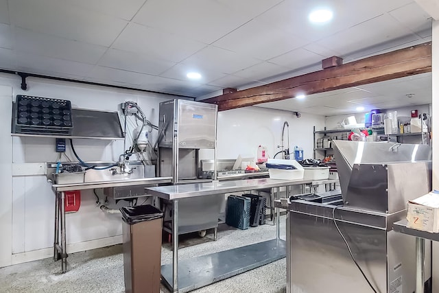 kitchen with a paneled ceiling and recessed lighting