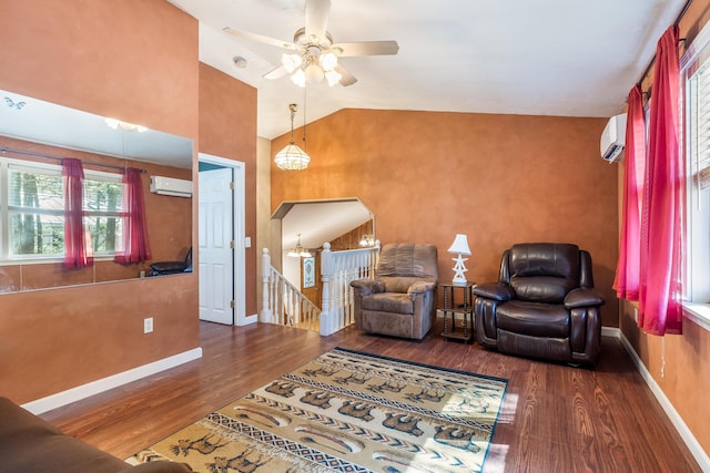 living area with baseboards, vaulted ceiling, wood finished floors, arched walkways, and a wall mounted AC