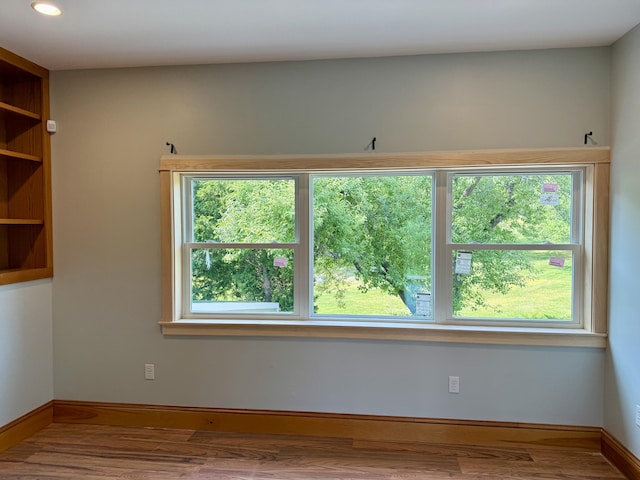 547 Mariaville Rd, Ellsworth, ME 04605 - spare room with wood finished floors, healthy amount of natural light, and recessed lighting