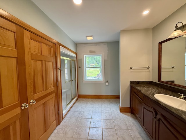 547 Mariaville Rd, Ellsworth, ME 04605 - bathroom featuring marble finish flooring, vanity, a stall shower, and recessed lighting