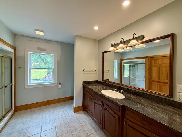 547 Mariaville Rd, Ellsworth, ME 04605 - full bathroom featuring a stall shower, vanity, marble look tile flooring, and recessed lighting