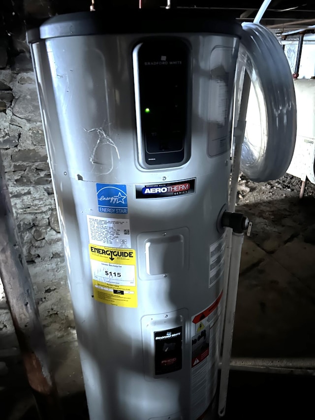 utility room with water heater