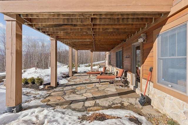 view of snow covered patio