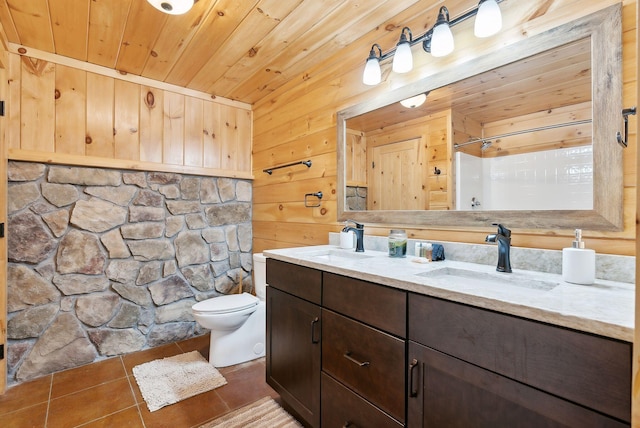 full bath with a shower with shower curtain, toilet, a sink, tile patterned flooring, and wooden ceiling