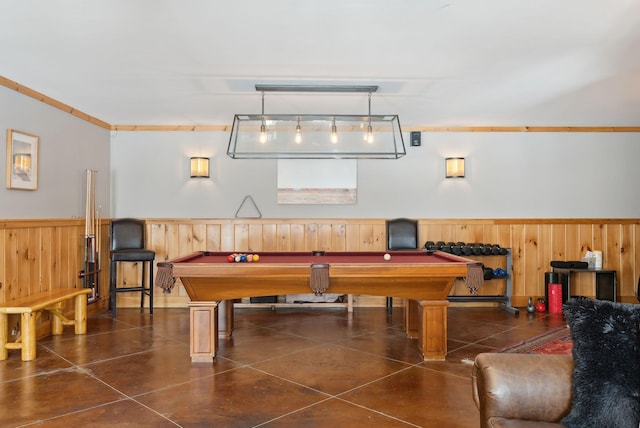 rec room with pool table, wainscoting, crown molding, and wooden walls