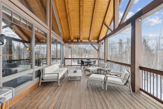 unfurnished sunroom with wooden ceiling and beam ceiling