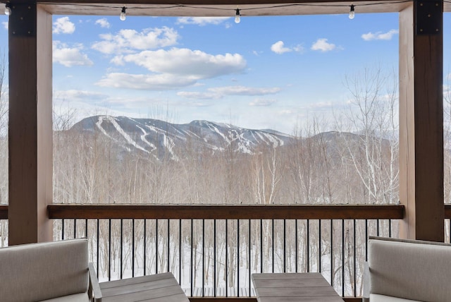 deck featuring a mountain view