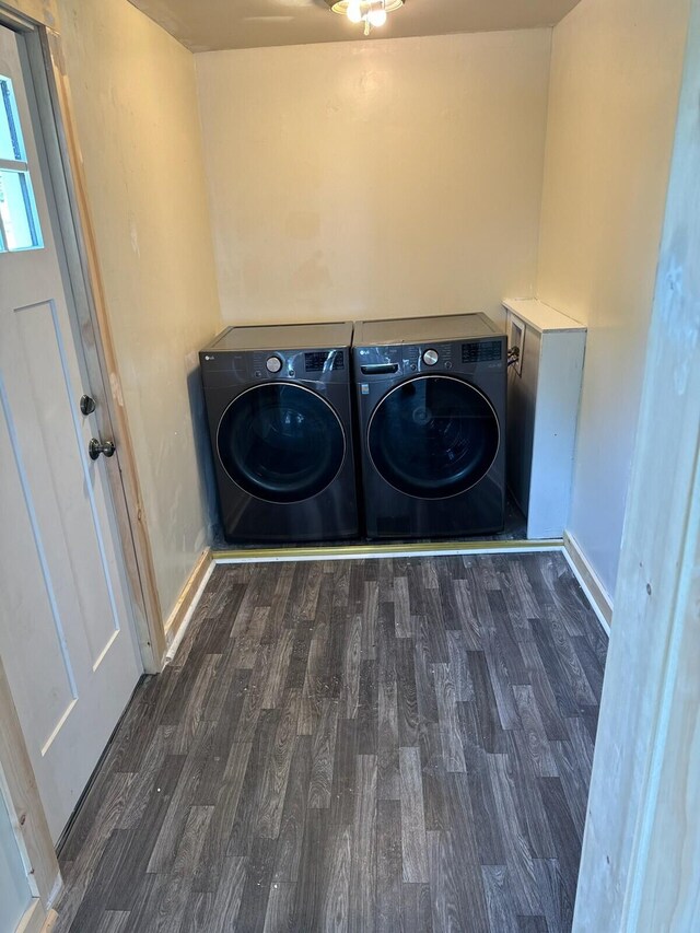 46 Collins St, Caribou, ME 04736 - washroom featuring laundry area, separate washer and dryer, wood finished floors, and baseboards
