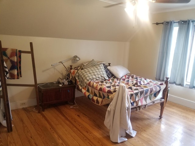 46 Collins St, Caribou, ME 04736 - bedroom with ceiling fan, vaulted ceiling, baseboards, and wood finished floors