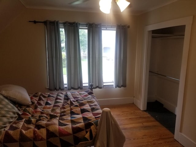 46 Collins St, Caribou, ME 04736 - bedroom featuring ceiling fan, a closet, light wood-style flooring, and baseboards