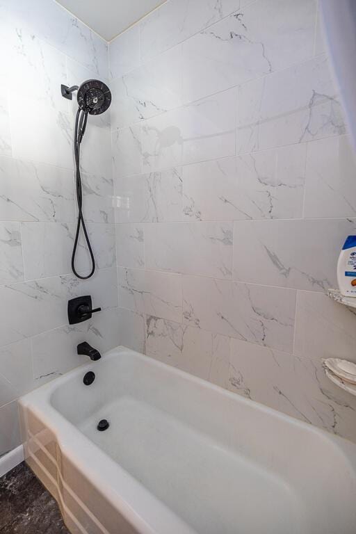 bathroom featuring washtub / shower combination