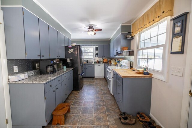 kitchen with ceiling fan, gray cabinetry, white appliances, decorative backsplash, and open shelves