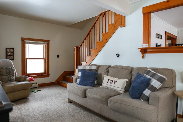 carpeted living area featuring a baseboard heating unit, baseboards, and stairway