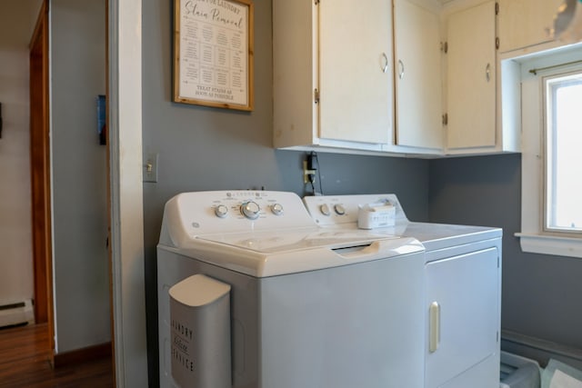 laundry area with a wealth of natural light, cabinet space, and independent washer and dryer