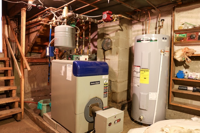 utility room featuring water heater and electric water heater