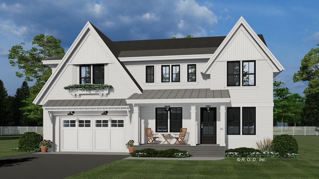 modern farmhouse style home with metal roof, a porch, aphalt driveway, a garage, and a standing seam roof