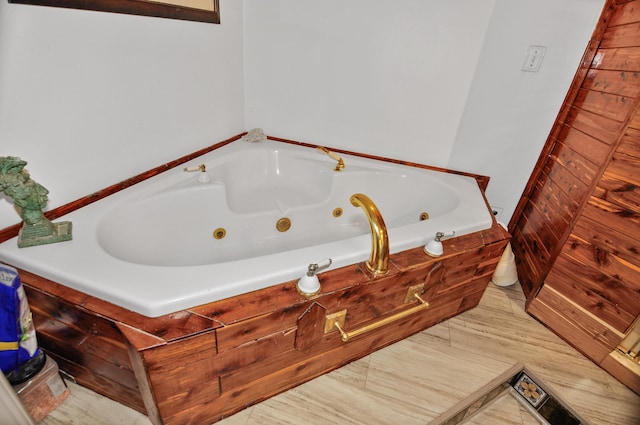 bathroom with a jetted tub