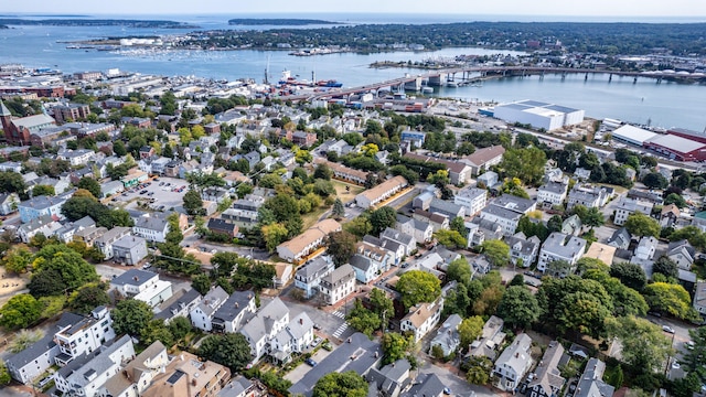 bird's eye view with a residential view and a water view