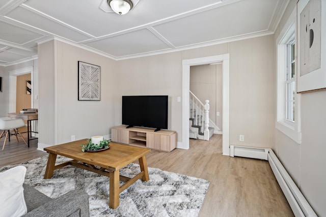 living room featuring stairway, light wood-style floors, a baseboard heating unit, crown molding, and baseboard heating