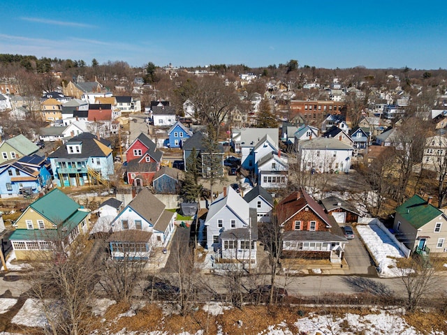 birds eye view of property with a residential view