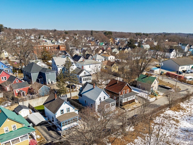 birds eye view of property with a residential view