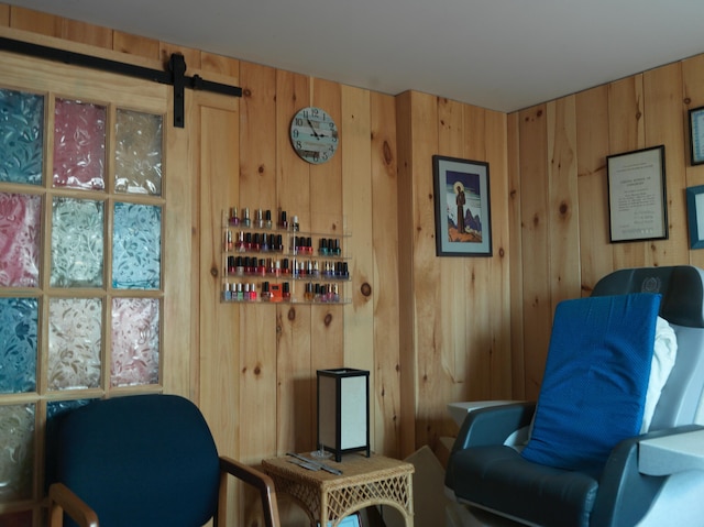 living area featuring wooden walls