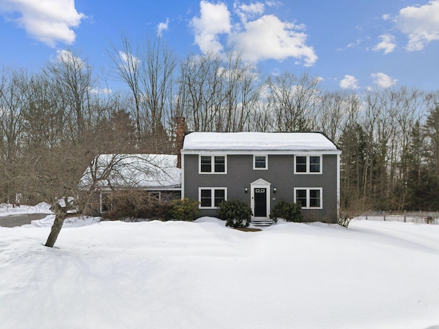 view of front of property with a chimney