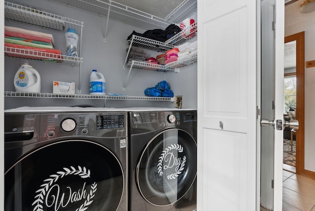 laundry area featuring laundry area and separate washer and dryer