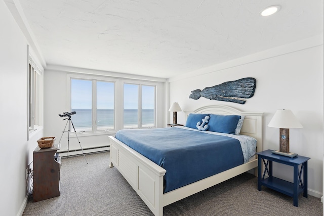 191 E Grand Ave Unit 606, Old Orchard Beach, ME 04064 - bedroom with a baseboard radiator, carpet, a water view, and baseboards