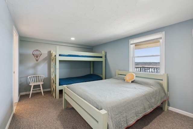 191 E Grand Ave Unit 606, Old Orchard Beach, ME 04064 - carpeted bedroom featuring baseboards