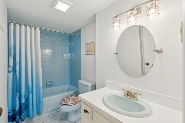 191 E Grand Ave Unit 606, Old Orchard Beach, ME 04064 - bathroom featuring vanity, shower / bath combination with curtain, toilet, and tile patterned flooring