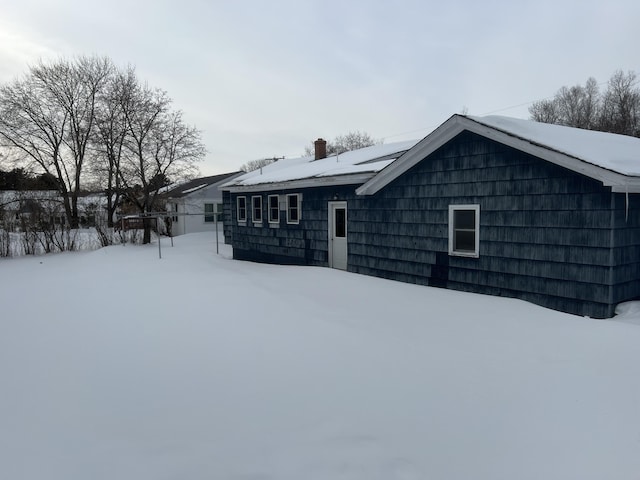 view of front of home with a chimney