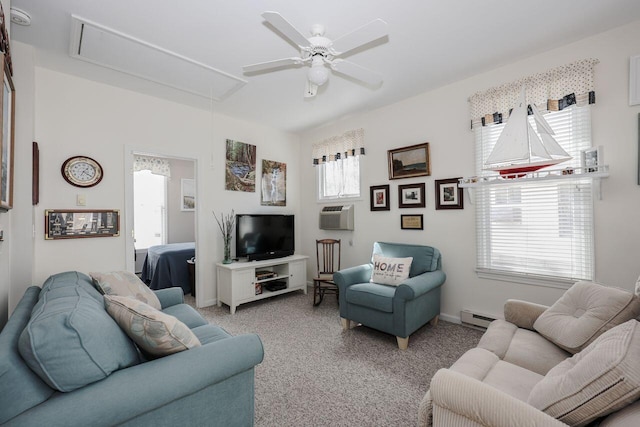 454 Post Rd Unit 128, Wells, ME 04090 - living area featuring a baseboard heating unit, baseboards, attic access, carpet flooring, and ceiling fan