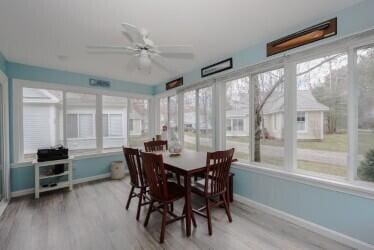 454 Post Rd Unit 128, Wells, ME 04090 - sunroom / solarium featuring plenty of natural light, wood finished floors, and baseboards