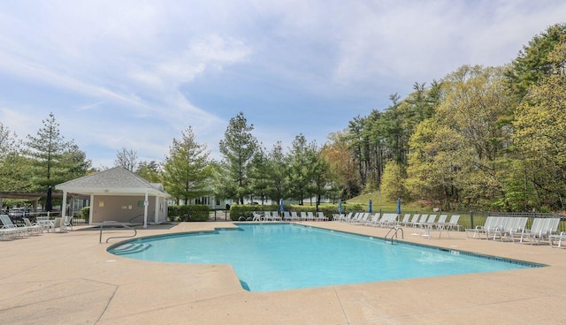 454 Post Rd Unit 128, Wells, ME 04090 - pool featuring fence and a patio area