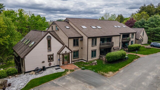 34 Parkwood Dr Unit 203, Augusta, ME 04330 - view of front of property with a shingled roof and a front lawn