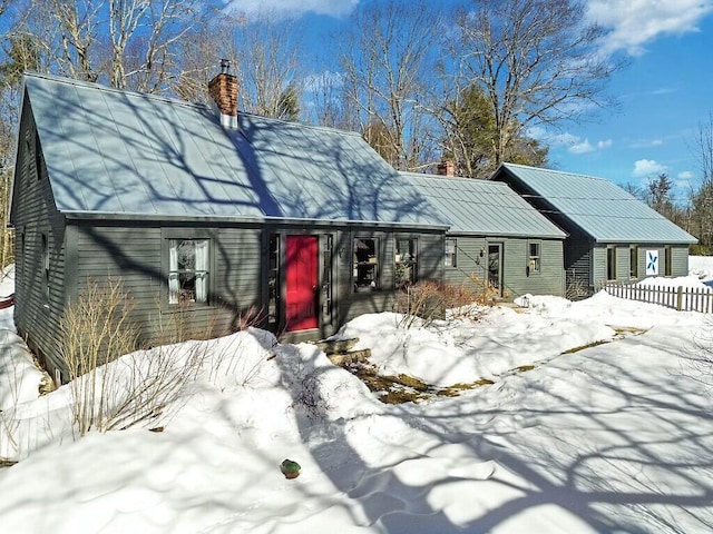 view of front of property with a chimney