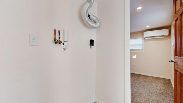 corridor with a wall mounted air conditioner, baseboards, carpet floors, and recessed lighting