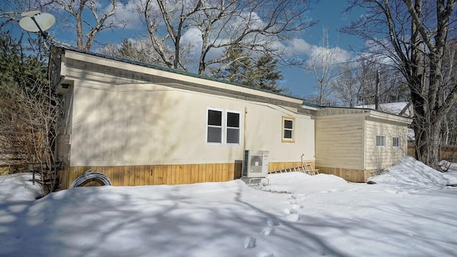 view of snow covered property