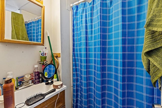 bathroom featuring a shower with curtain