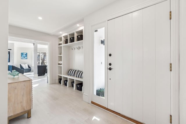 mudroom featuring light wood-style floors and recessed lighting