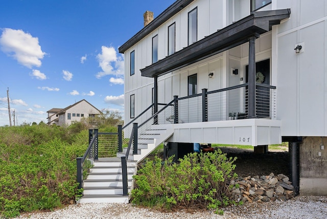 107 Marshall Point Rd, Kennebunkport, ME 04046 - view of home's exterior featuring board and batten siding and stairs