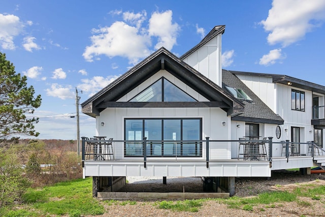 107 Marshall Point Rd, Kennebunkport, ME 04046 - rear view of property featuring a wooden deck, a shingled roof, and board and batten siding