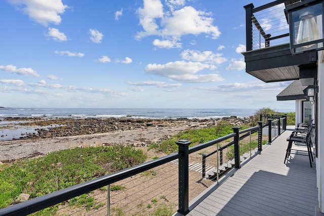 107 Marshall Point Rd, Kennebunkport, ME 04046 - wooden deck with view of water and beach