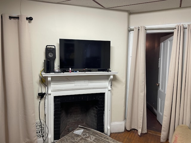 124 Sherman St, Portland, ME 04101 - details featuring a fireplace and wood finished floors