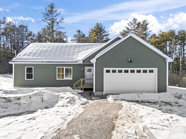 ranch-style home featuring an attached garage