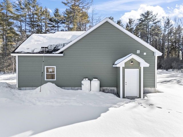 view of snow covered property