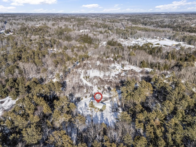 aerial view featuring a view of trees